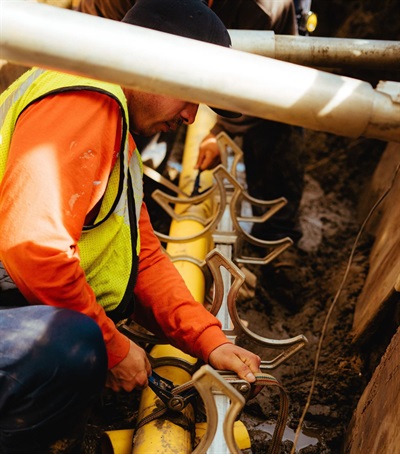 worker on gas pipes